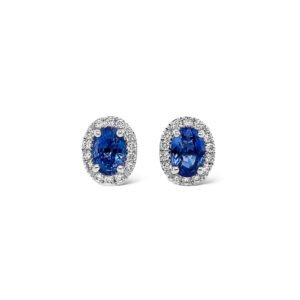 Aros de zafiro ovalados y halo de diamantes