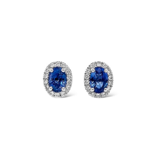 Aros de zafiro ovalados y halo de diamantes